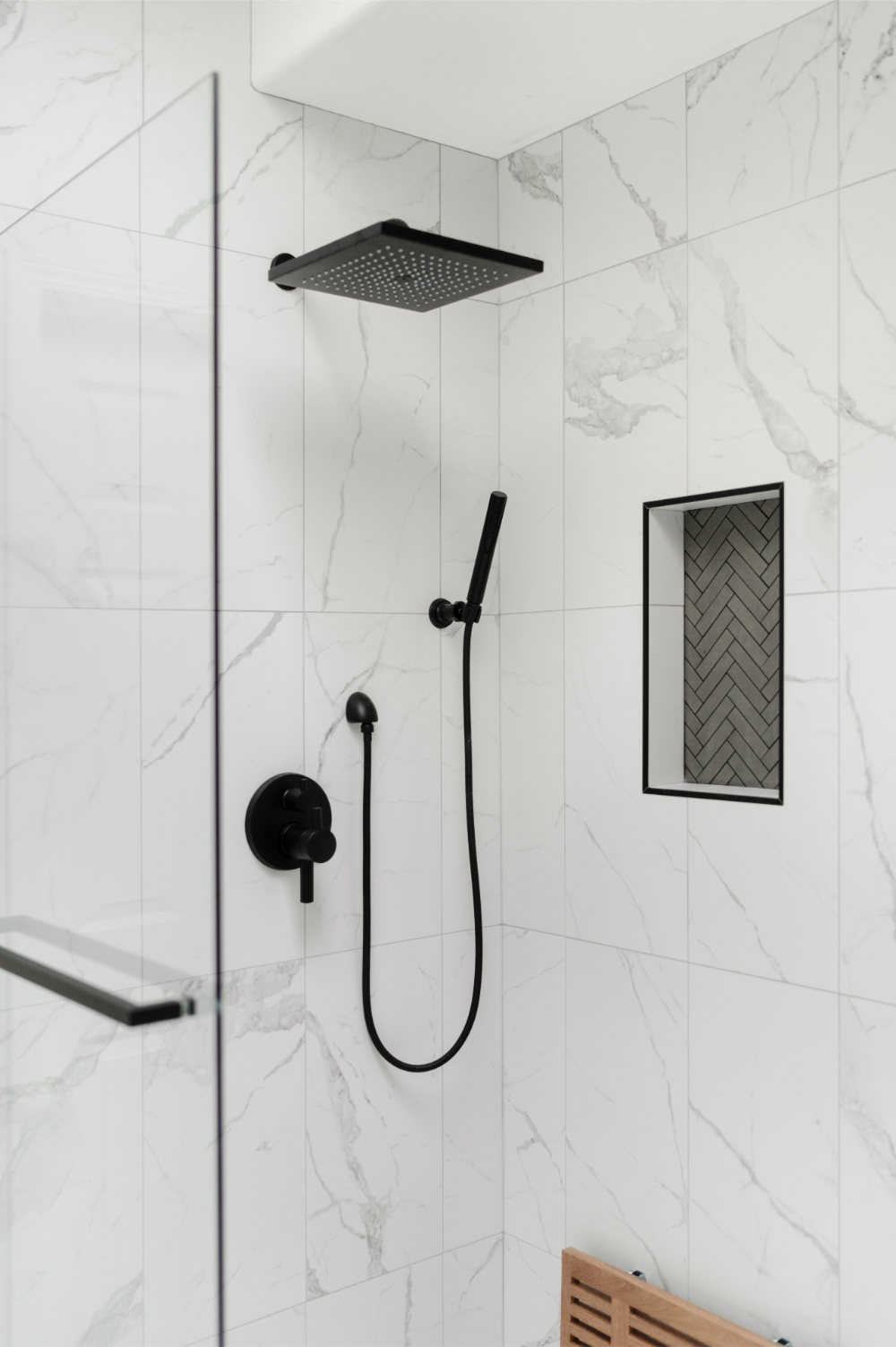 aging in place design with handheld shower and foldable bench