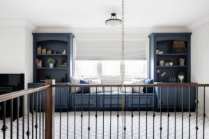 Custom built-in shelving and seating designed to feel both personal and timeless, guided by an interior design process rooted in lifestyle.