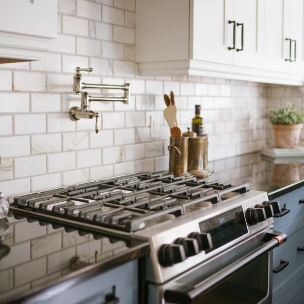 cochrane-kitchen-walnut-range-hood-marble-backsplash