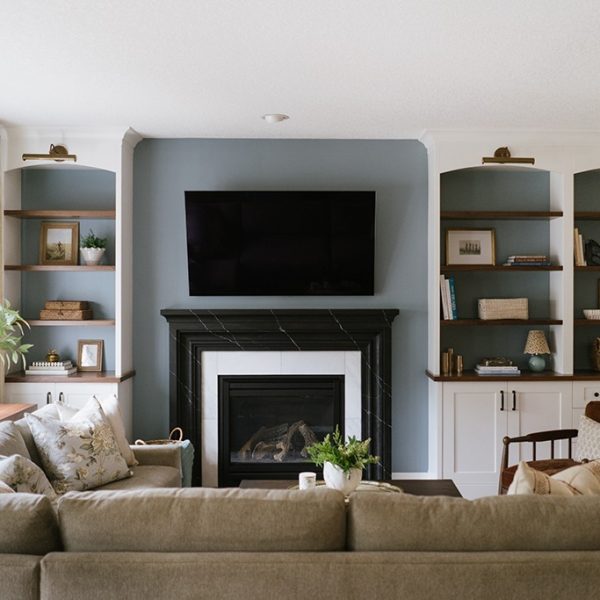 cochrane-living-room-marble-fireplace-custom-built-ins